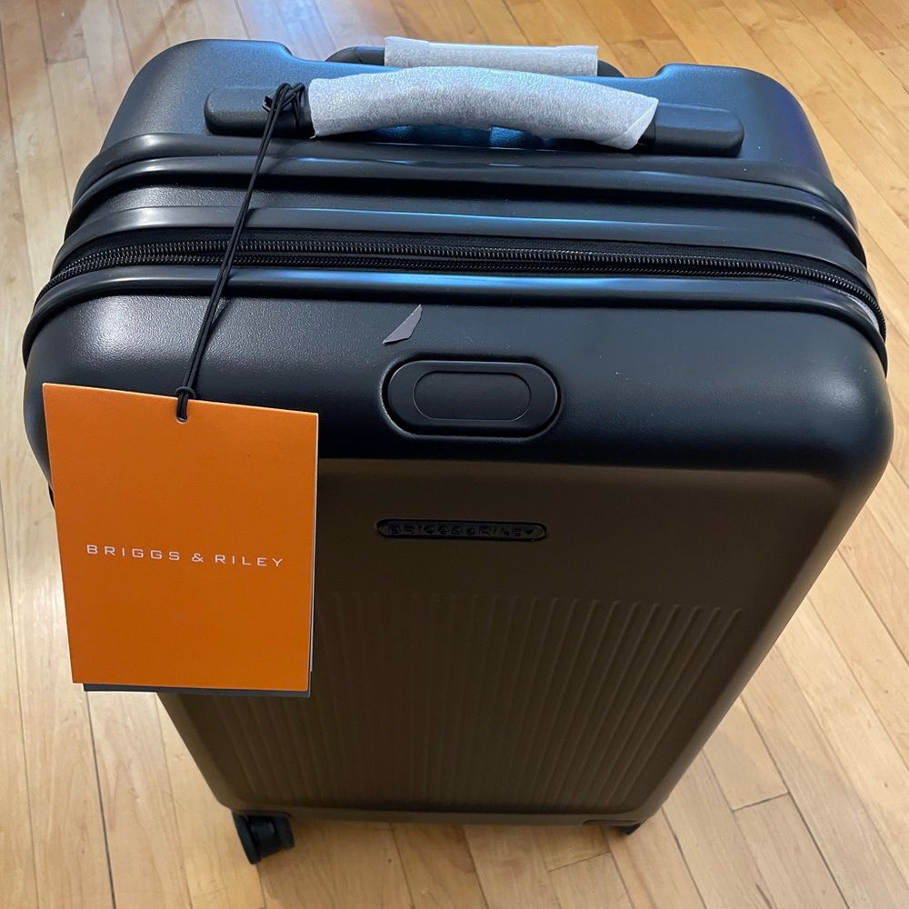 Briggs & Riley Sympatico 22” carry-on expandable spinner suitcase with tags